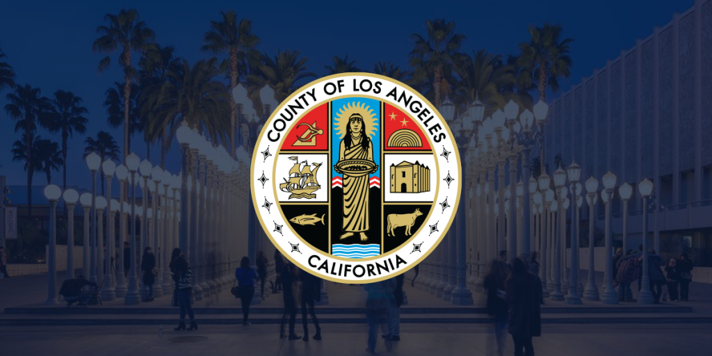 The County seal superimposed on a photo of the Urban Lights exhibit at LACMA